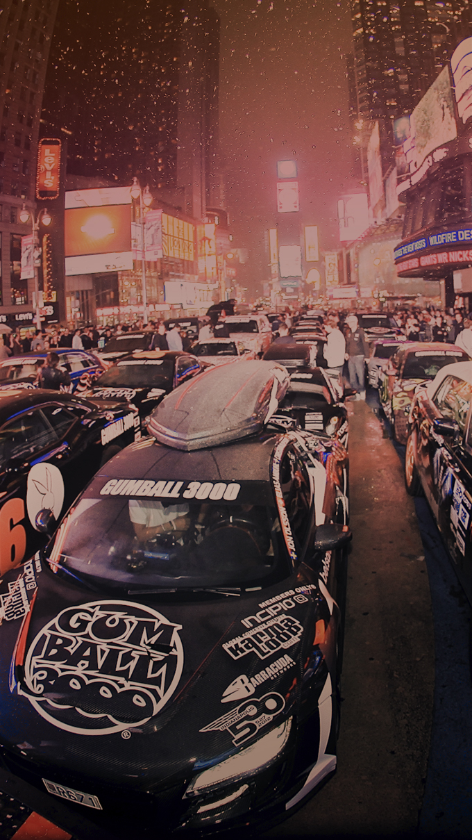 A Gumball 3000 car crossing the city centrer.