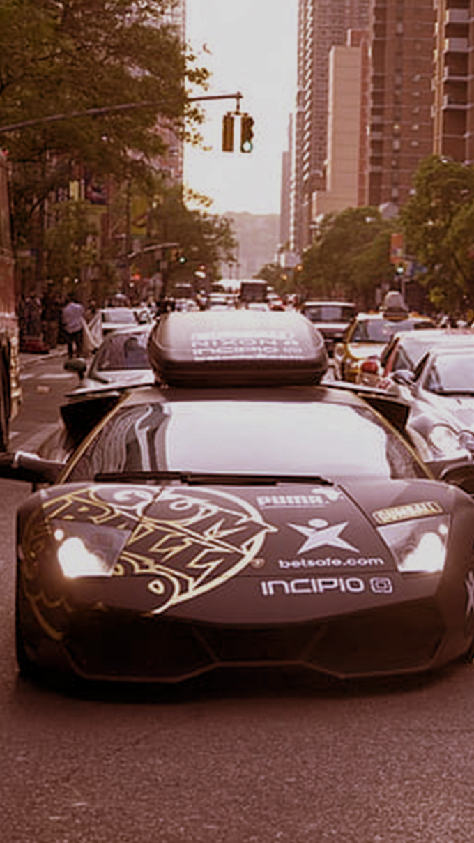 Gumball rally cars driving in Toronto downtown